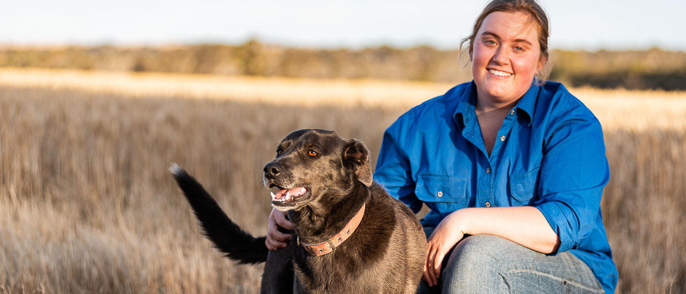 A Lady Sitting With Dog